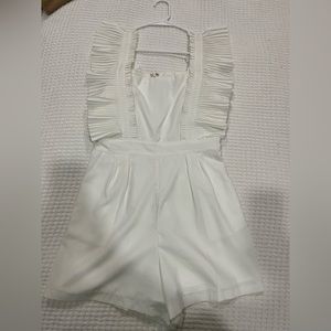 Boutique white romper. Perfect for bridal showers!